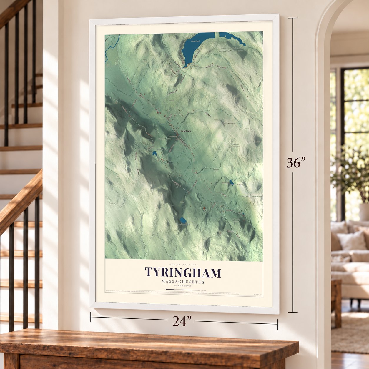 Tyringham, Massachusetts map, 24 x 36 inch print in a white frame by a staircase