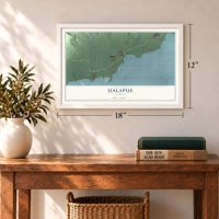 Ualapue, Hawaii map, 12 x 18 inch print in a white frame in an entryway