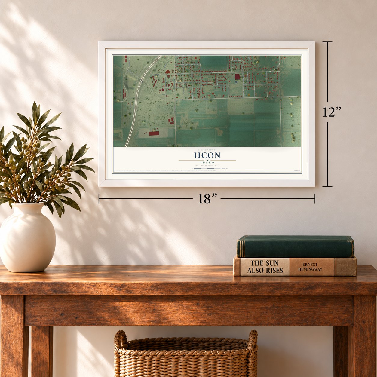 Ucon, Idaho map, 12 x 18 inch print in a white frame in an entryway