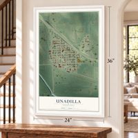 Unadilla, Nebraska map, 24 x 36 inch print in a white frame by a staircase