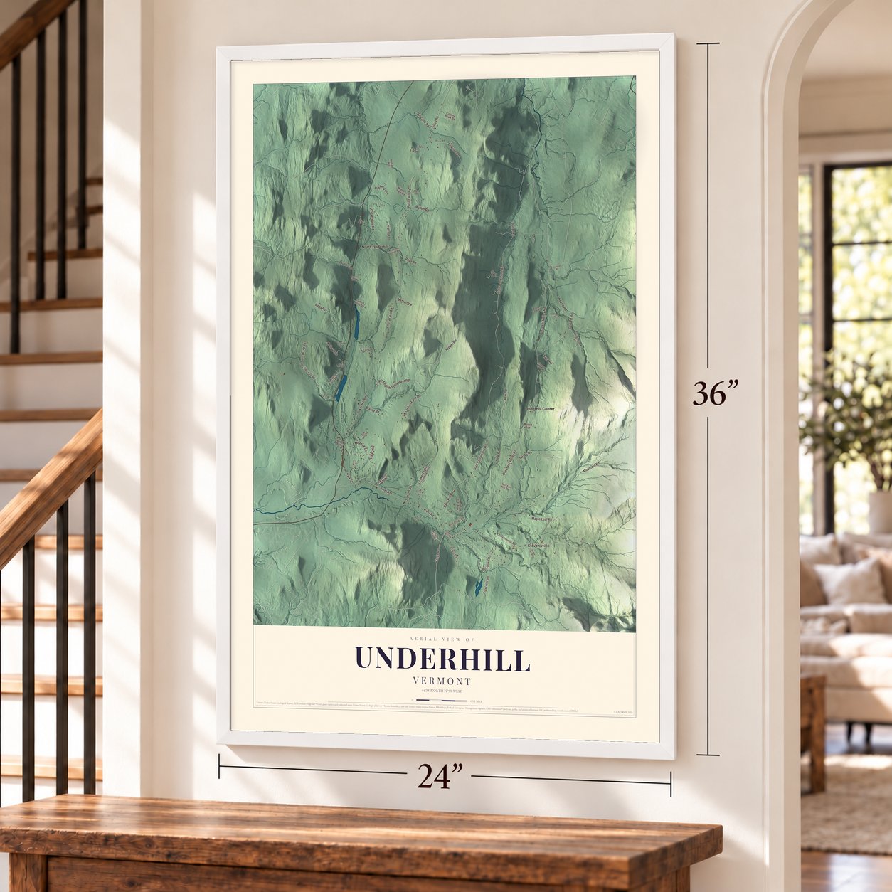 Underhill, Vermont map, 24 x 36 inch print in a white frame by a staircase