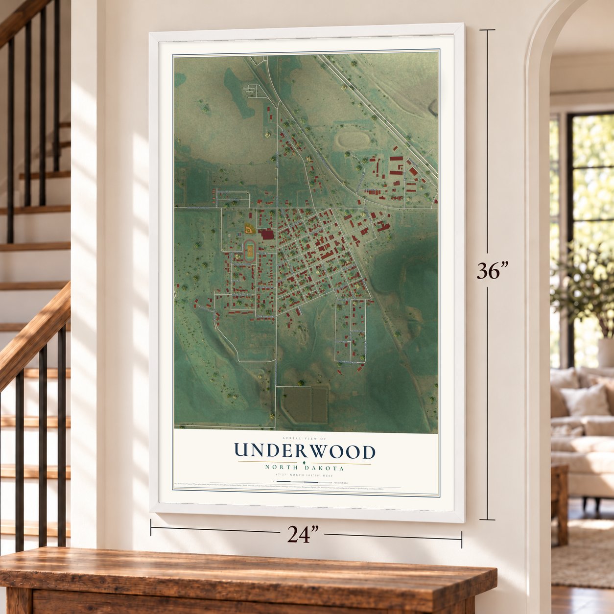 Underwood, North Dakota map, 24 x 36 inch print in a white frame by a staircase