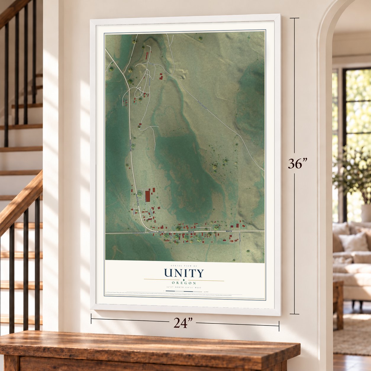 Unity, Oregon map, 24 x 36 inch print in a white frame by a staircase