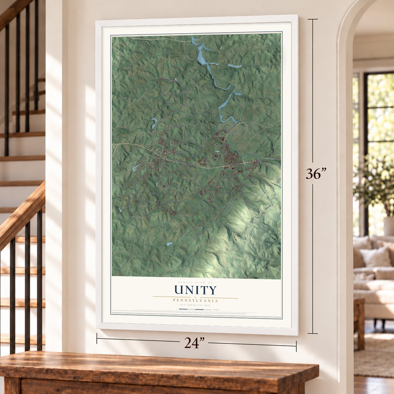 Unity, Pennsylvania map, 24 x 36 inch print in a white frame by a staircase