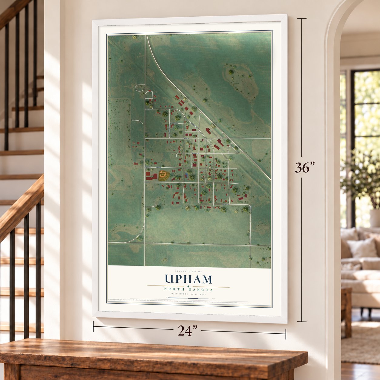Upham, North Dakota map, 24 x 36 inch print in a white frame by a staircase