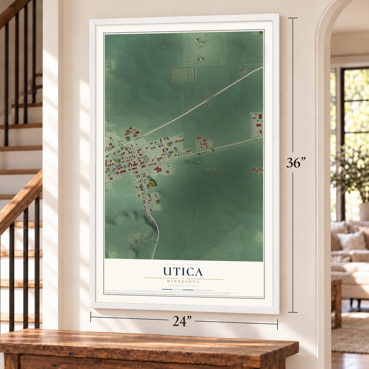 Utica, Minnesota map, 24 x 36 inch print in a white frame by a staircase