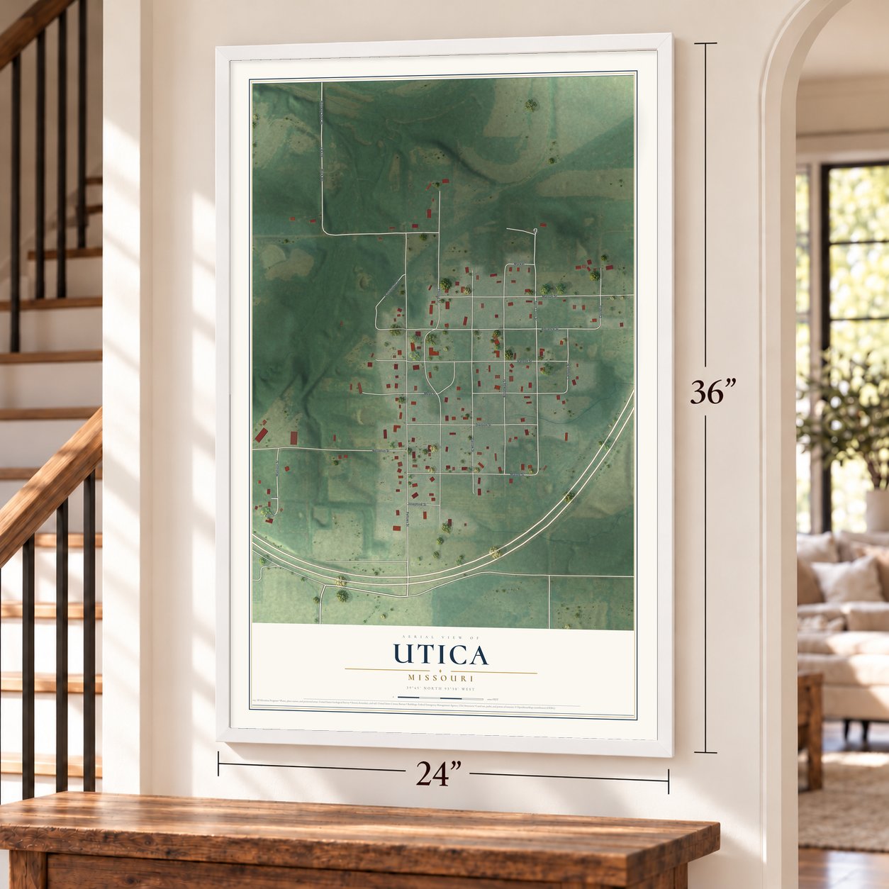 Utica, Missouri map, 24 x 36 inch print in a white frame by a staircase