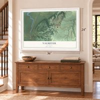 Valmeyer, Illinois map, 24 x 36 inch print in a white frame above a dresser by a staircase
