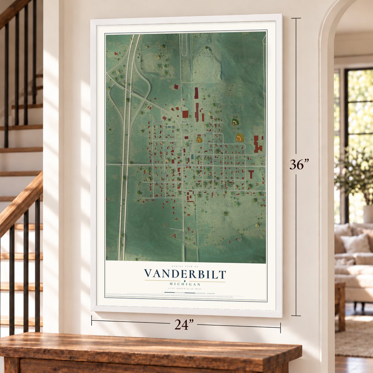 Vanderbilt, Michigan map, 24 x 36 inch print in a white frame by a staircase