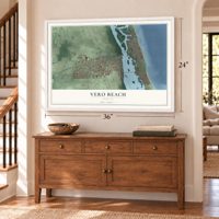 Vero Beach, Florida map, 24 x 36 inch print in a white frame above a dresser by a staircase