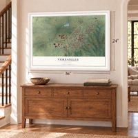 Versailles, Missouri map, 24 x 36 inch print in a white frame above a dresser by a staircase