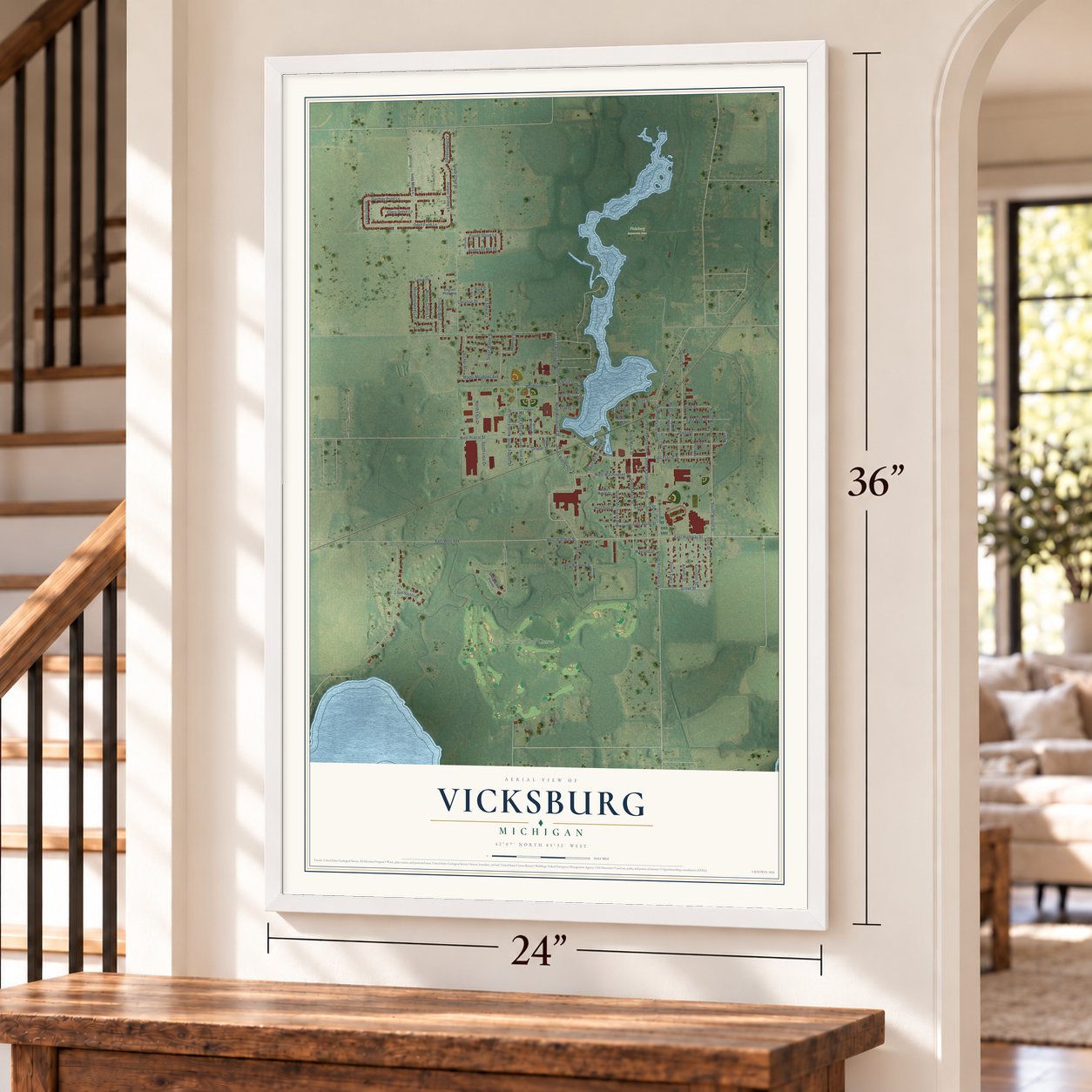 Vicksburg, Michigan map, 24 x 36 inch print in a white frame by a staircase
