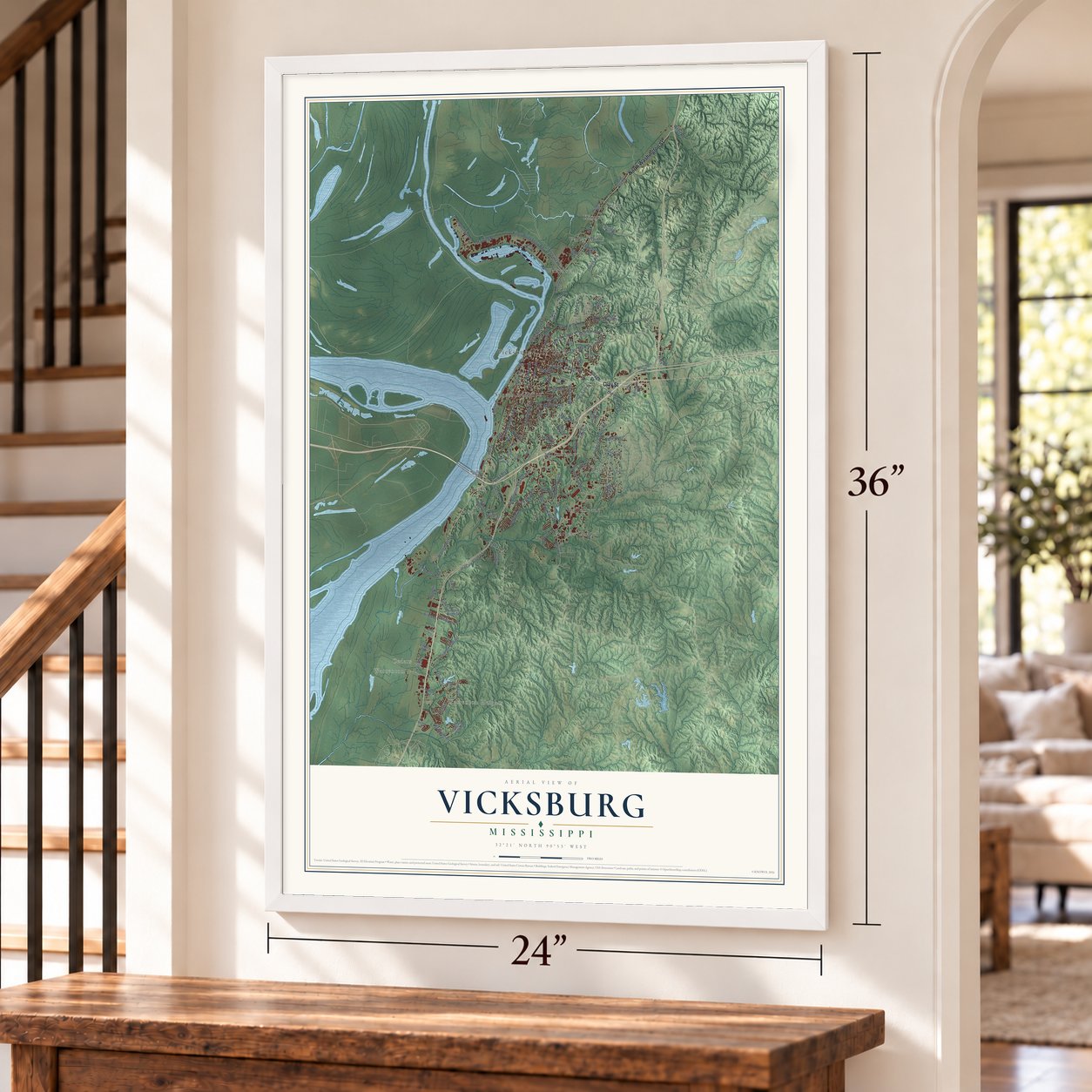 Vicksburg, Mississippi map, 24 x 36 inch print in a white frame by a staircase