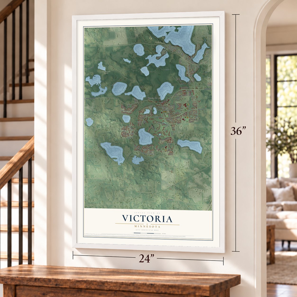 Victoria, Minnesota map, 24 x 36 inch print in a white frame by a staircase