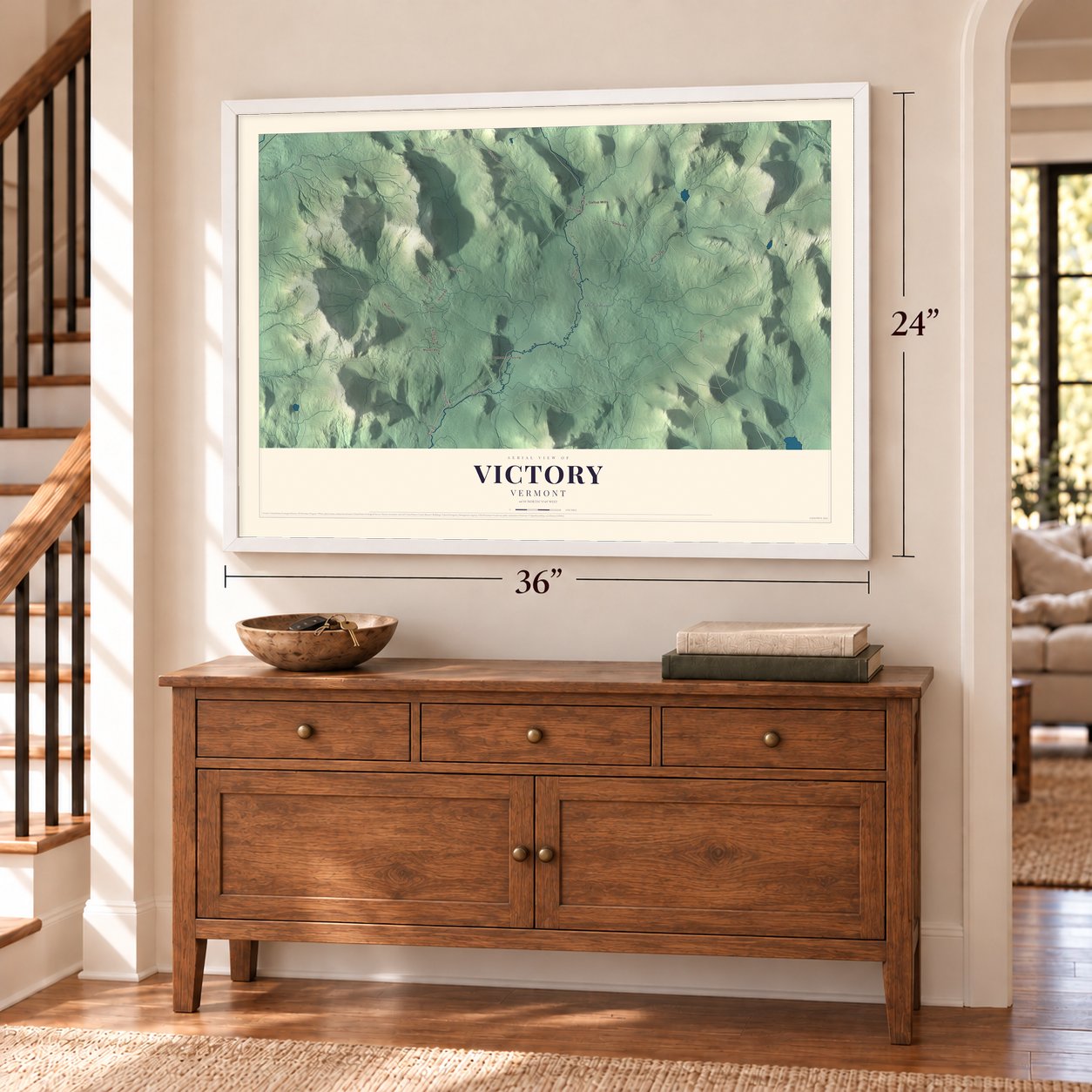 Victory, Vermont map, 24 x 36 inch print in a white frame above a dresser by a staircase