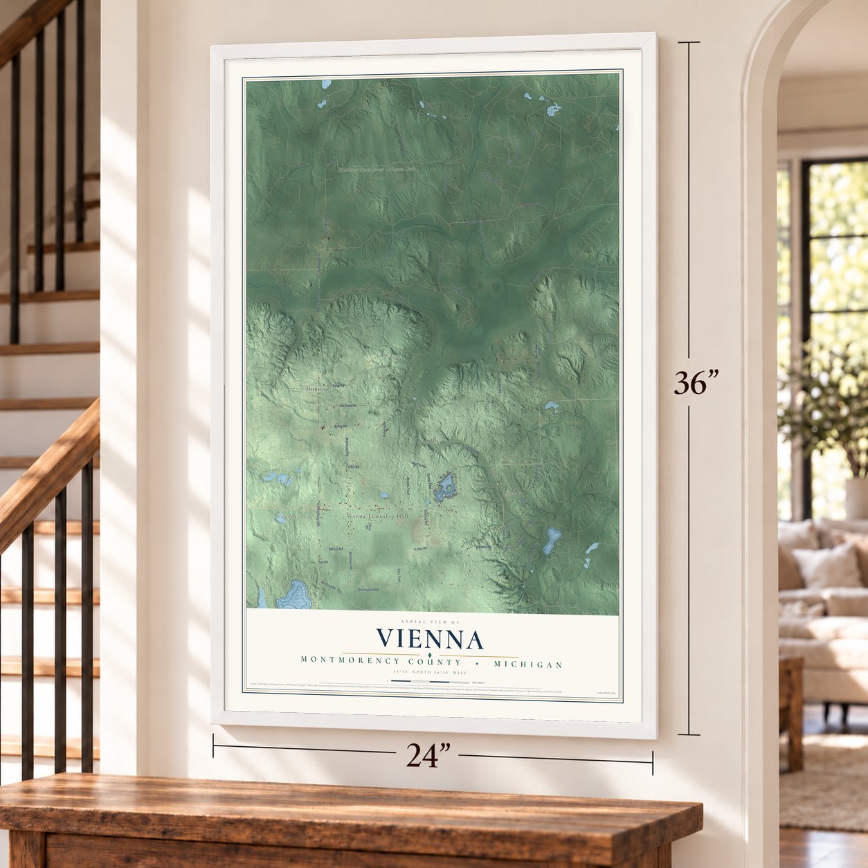 Vienna, Montmorency County, Michigan map, 24 x 36 inch print in a white frame by a staircase