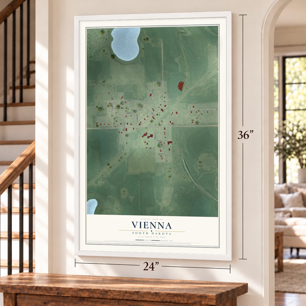 Vienna, South Dakota map, 24 x 36 inch print in a white frame by a staircase