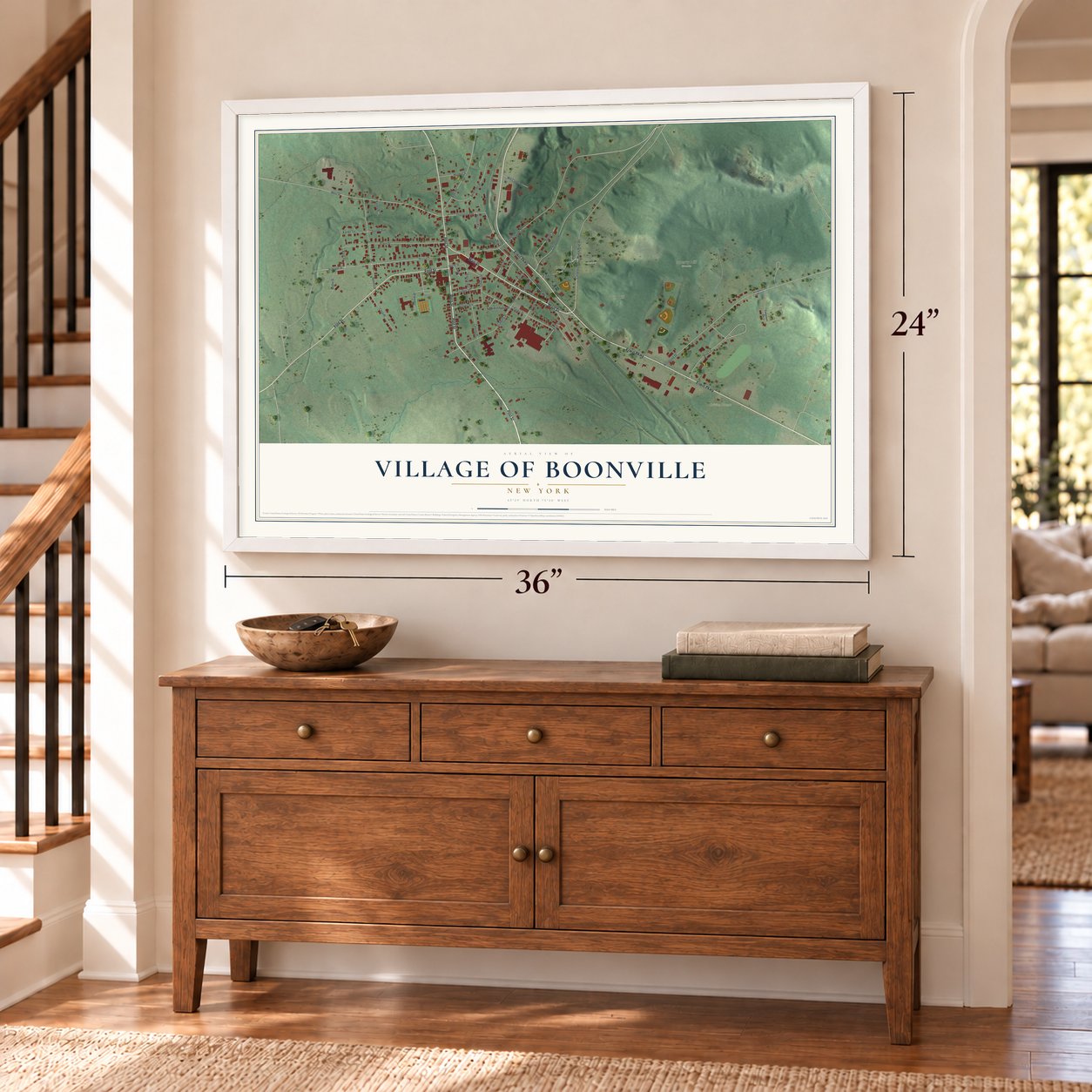 Village of Boonville, New York map, 24 x 36 inch print in a white frame above a dresser by a staircase