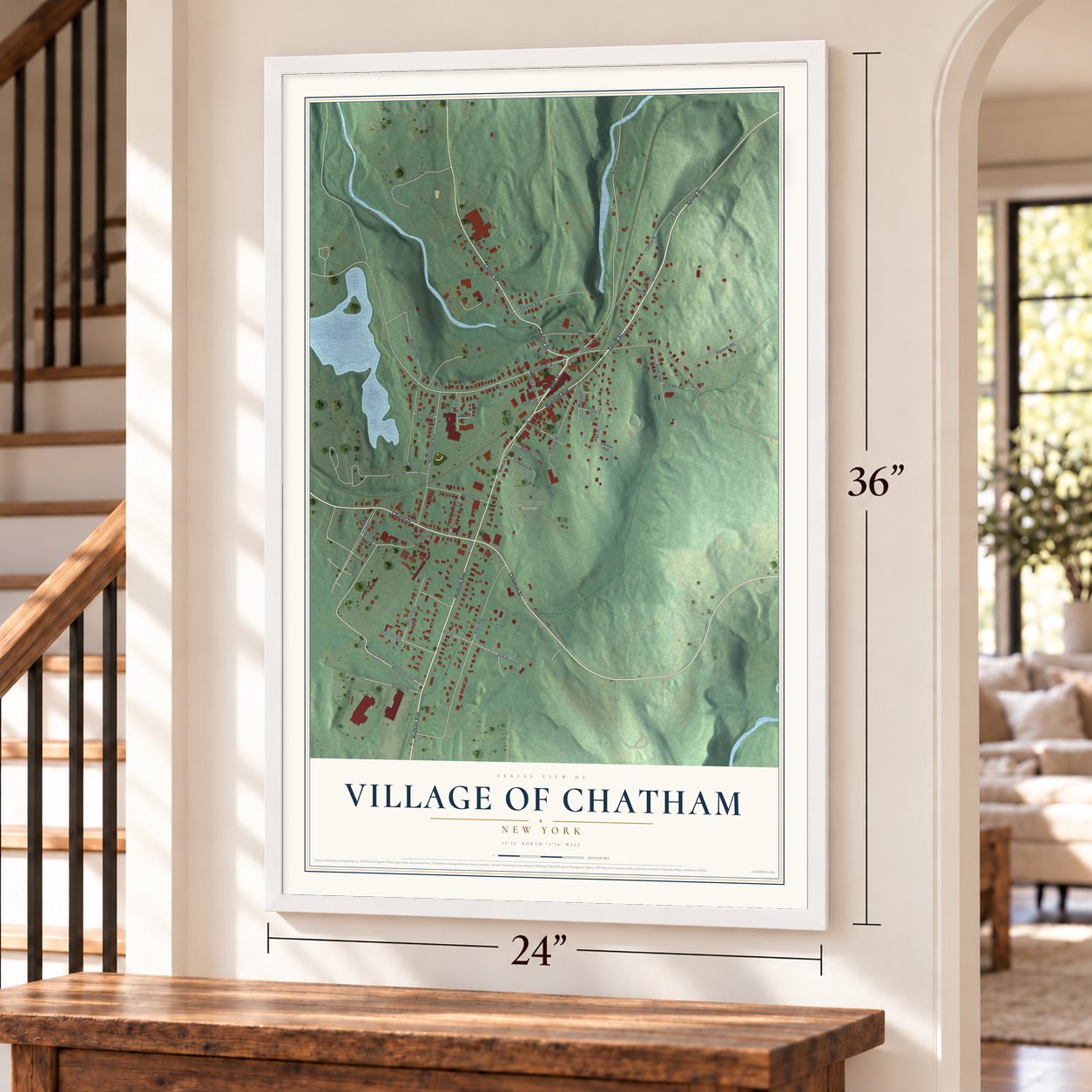 Village of Chatham, New York map, 24 x 36 inch print in a white frame by a staircase