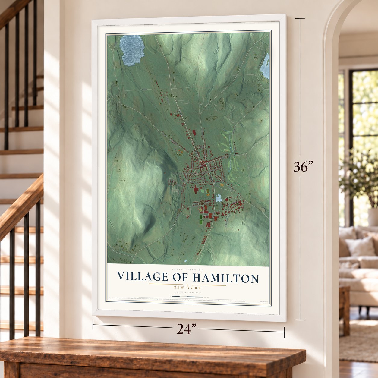 Village of Hamilton, New York map, 24 x 36 inch print in a white frame by a staircase
