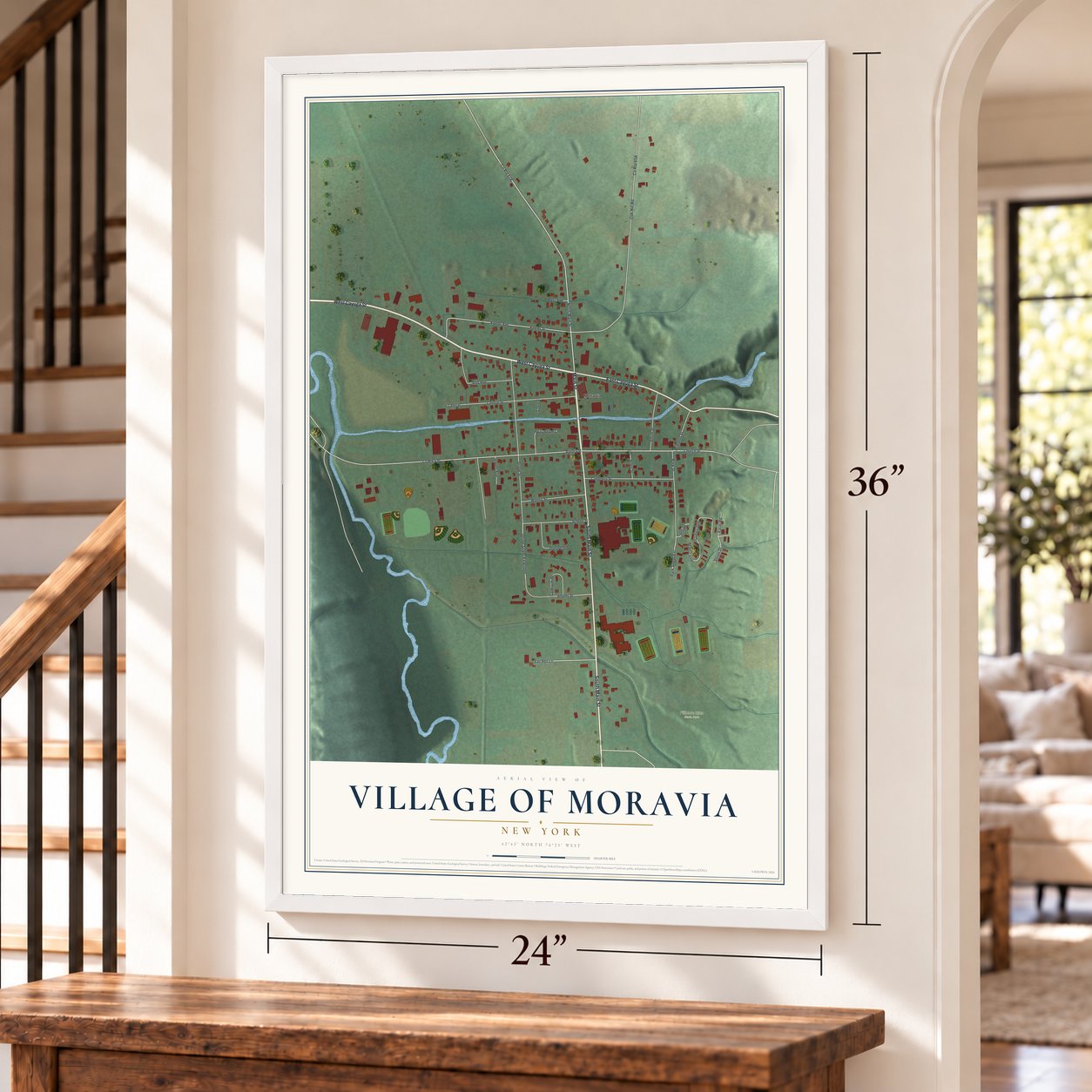 Village of Moravia, New York map, 24 x 36 inch print in a white frame by a staircase