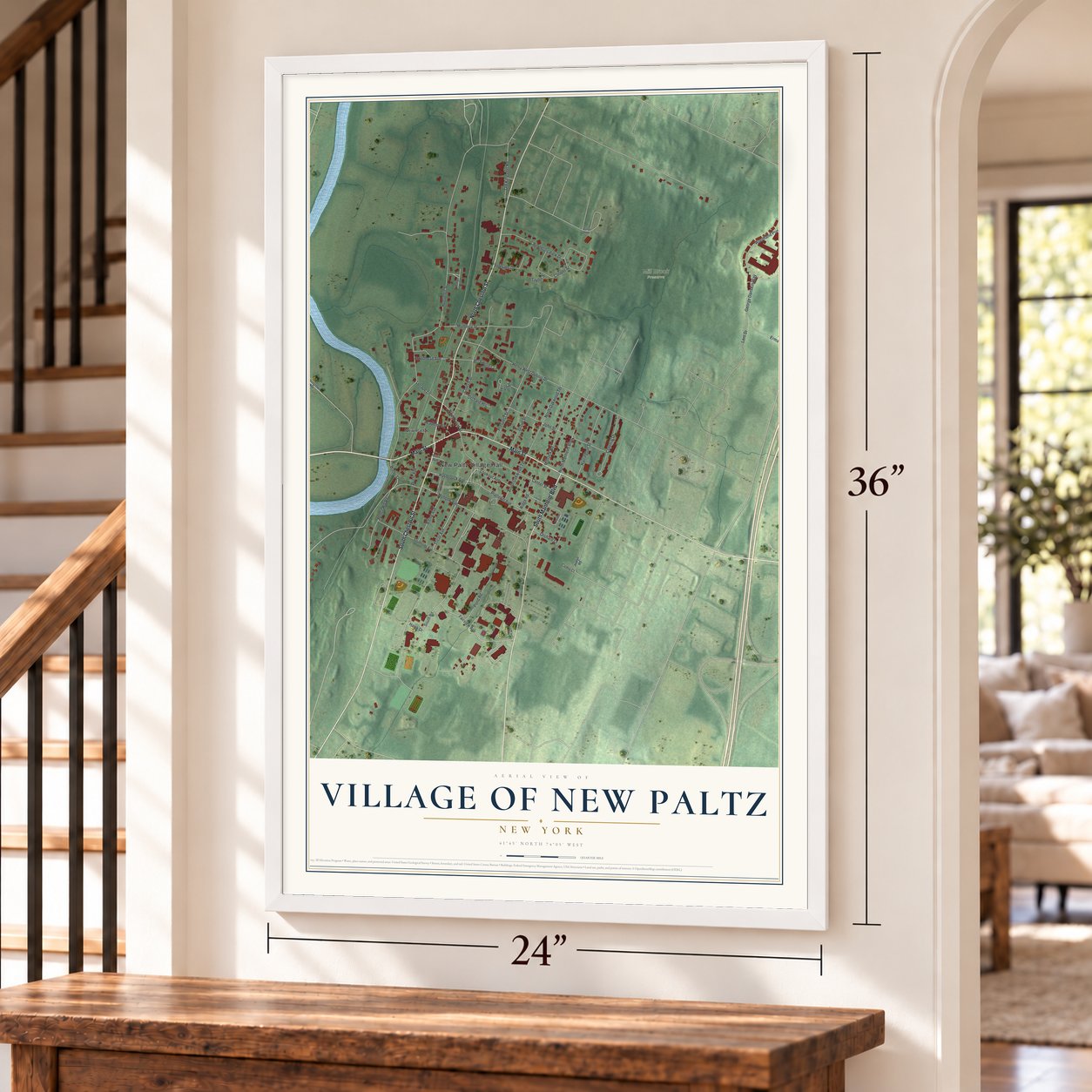 Village of New Paltz, New York map, 24 x 36 inch print in a white frame by a staircase