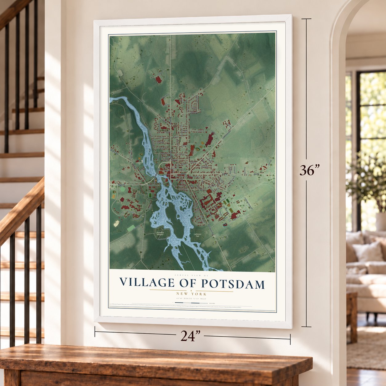 Village of Potsdam, New York map, 24 x 36 inch print in a white frame by a staircase