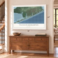 Village of Southampton, New York map, 24 x 36 inch print in a white frame above a dresser by a staircase