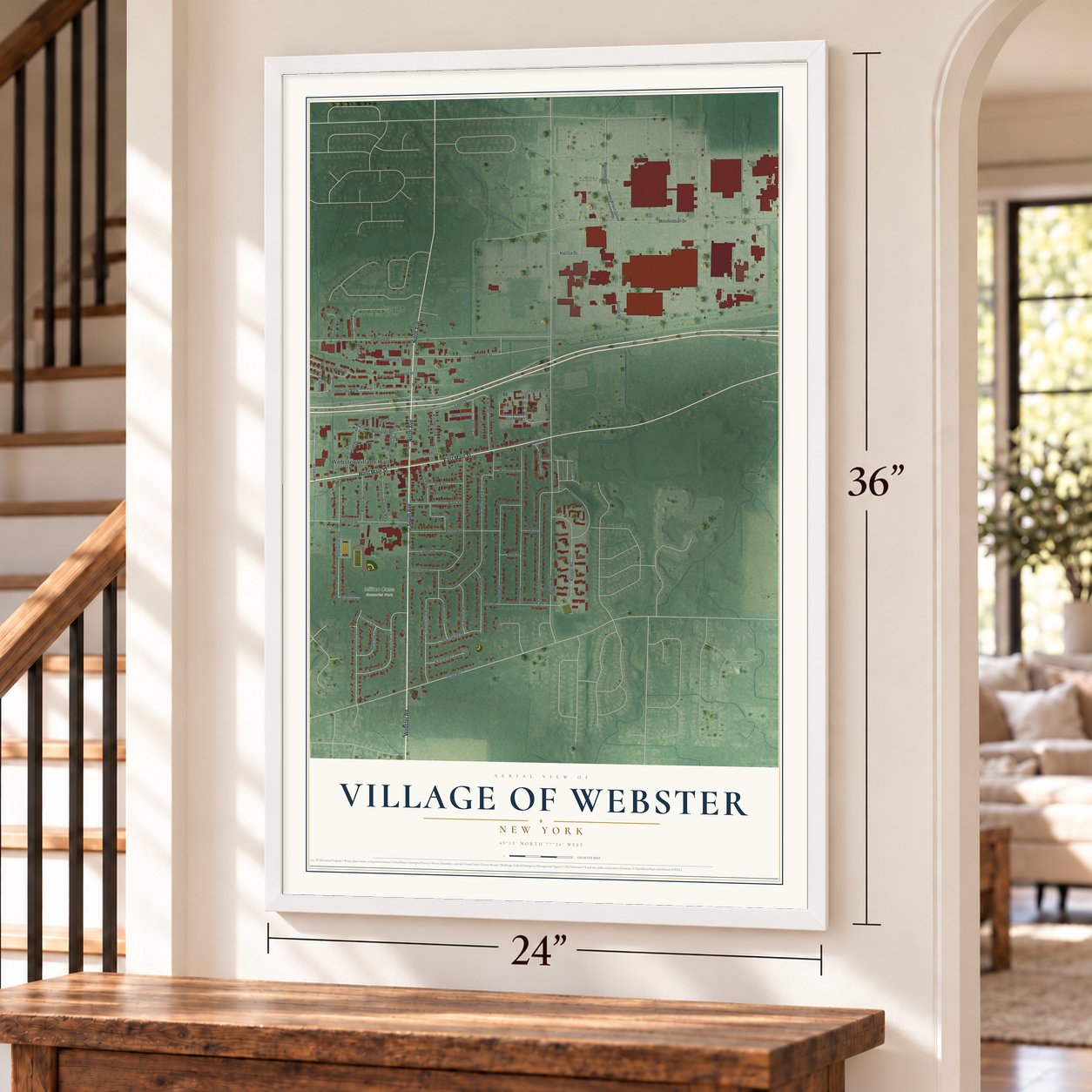 Village of Webster, New York map, 24 x 36 inch print in a white frame by a staircase