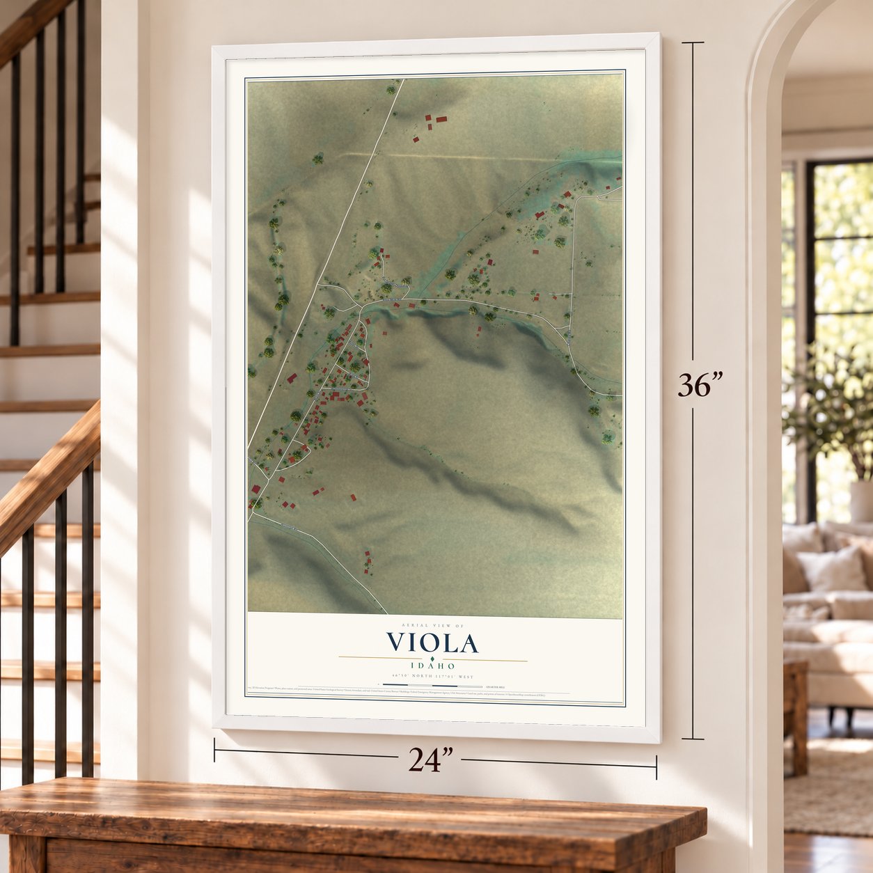 Viola, Idaho map, 24 x 36 inch print in a white frame by a staircase