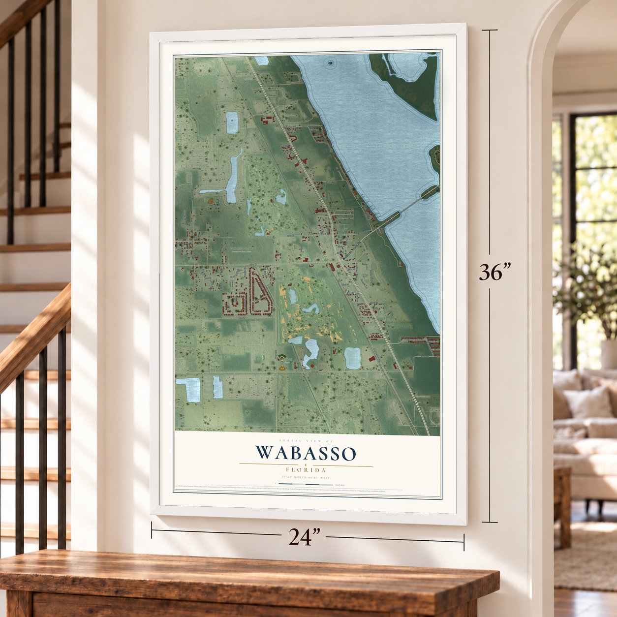 Wabasso, Florida map, 24 x 36 inch print in a white frame by a staircase