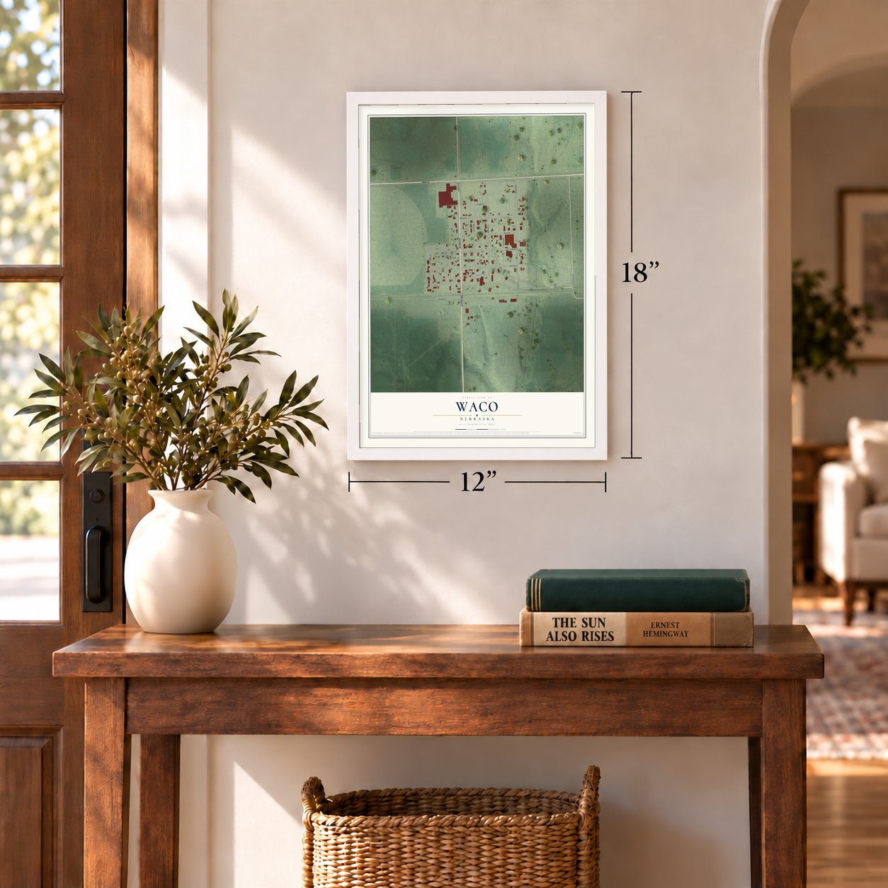 Waco, Nebraska map, 12 x 18 inch print in a white frame in an entryway