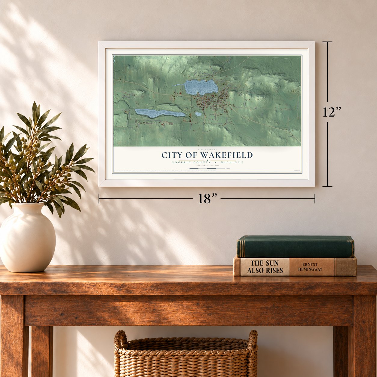 Wakefield, Michigan map, 12 x 18 inch print in a white frame in an entryway