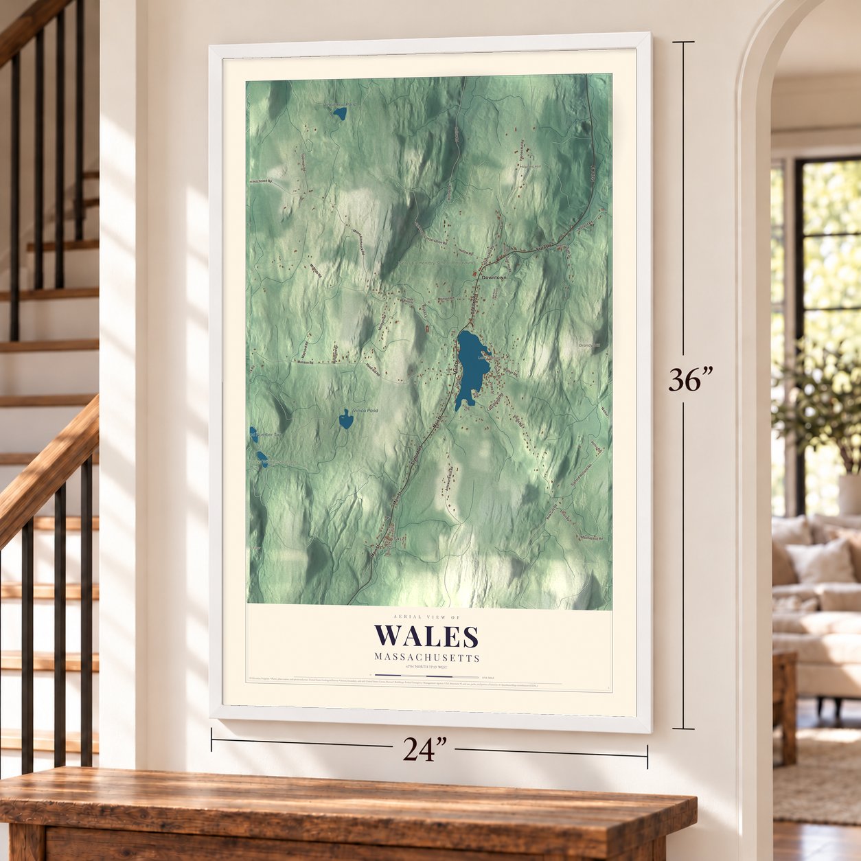 Wales, Massachusetts map, 24 x 36 inch print in a white frame by a staircase