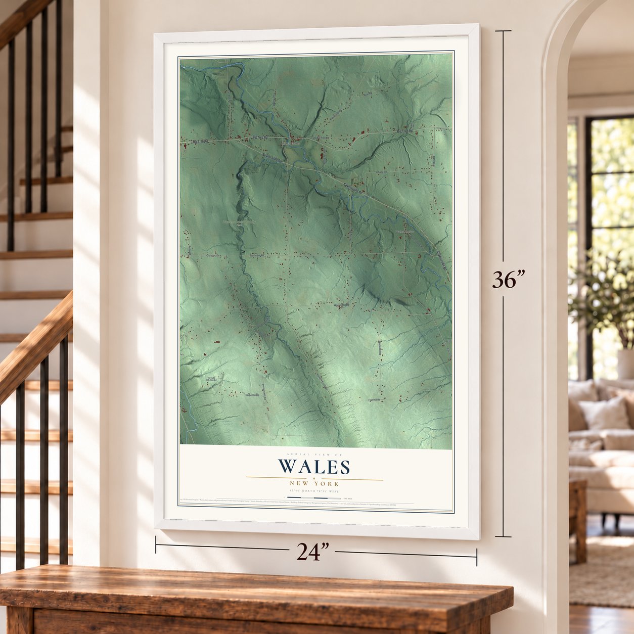 Wales, New York map, 24 x 36 inch print in a white frame by a staircase