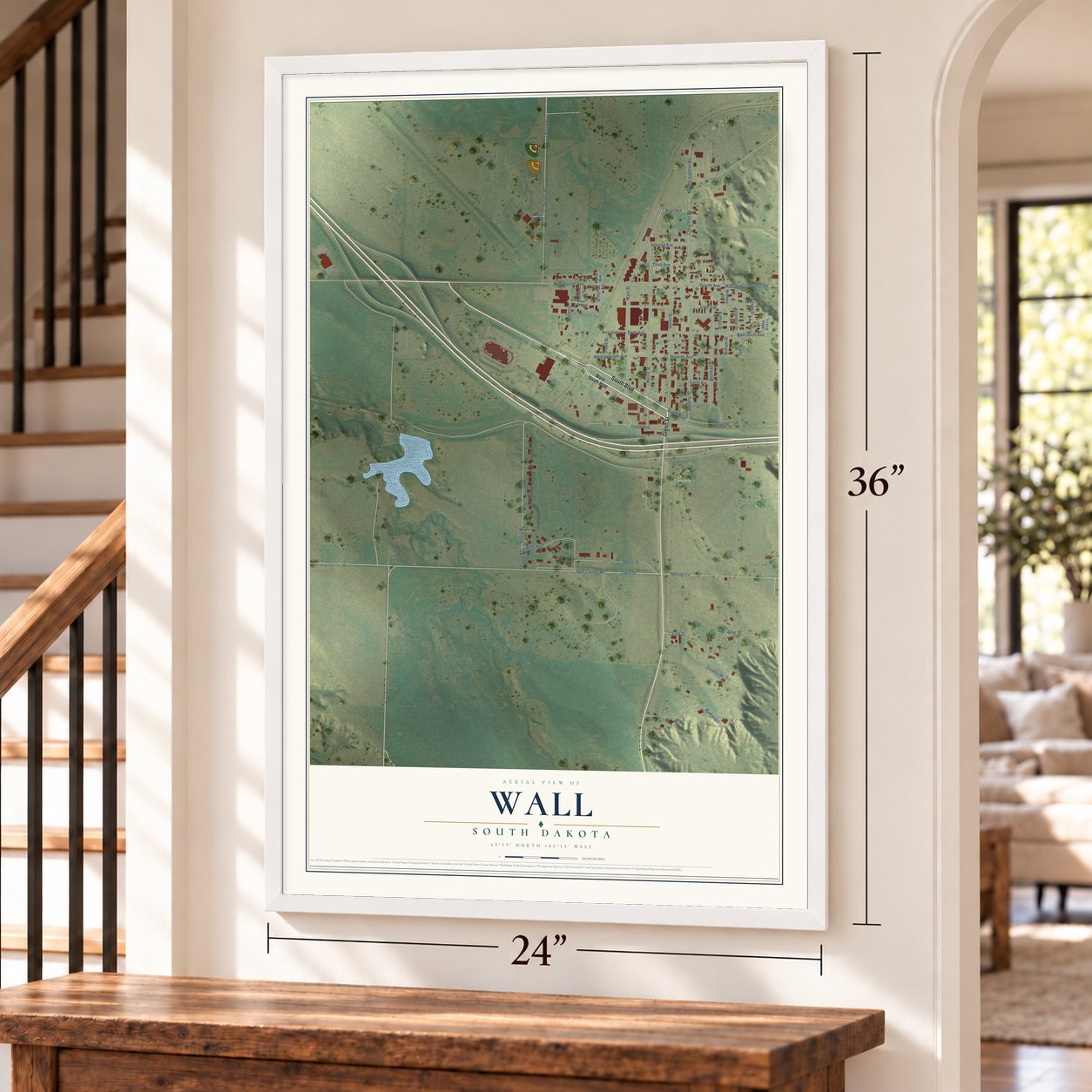 Wall, South Dakota map, 24 x 36 inch print in a white frame by a staircase