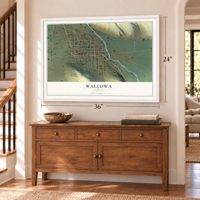 Wallowa, Oregon map, 24 x 36 inch print in a white frame above a dresser by a staircase