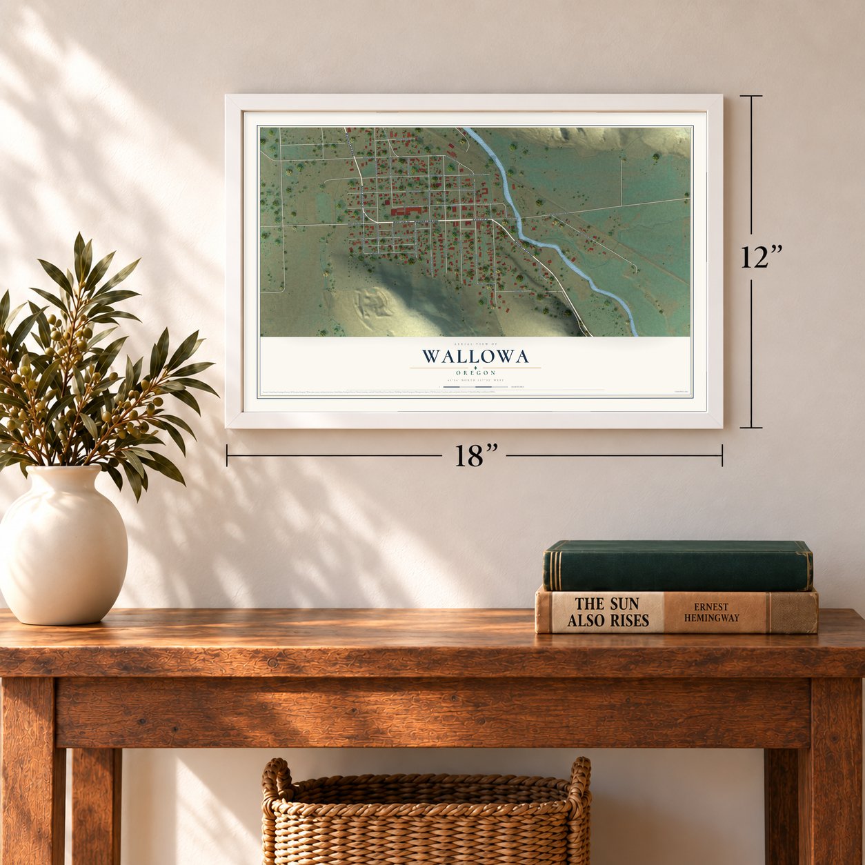 Wallowa, Oregon map, 12 x 18 inch print in a white frame in an entryway
