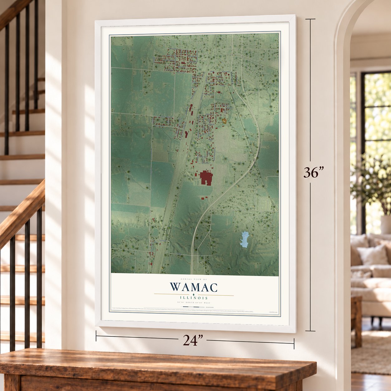 Wamac, Illinois map, 24 x 36 inch print in a white frame by a staircase