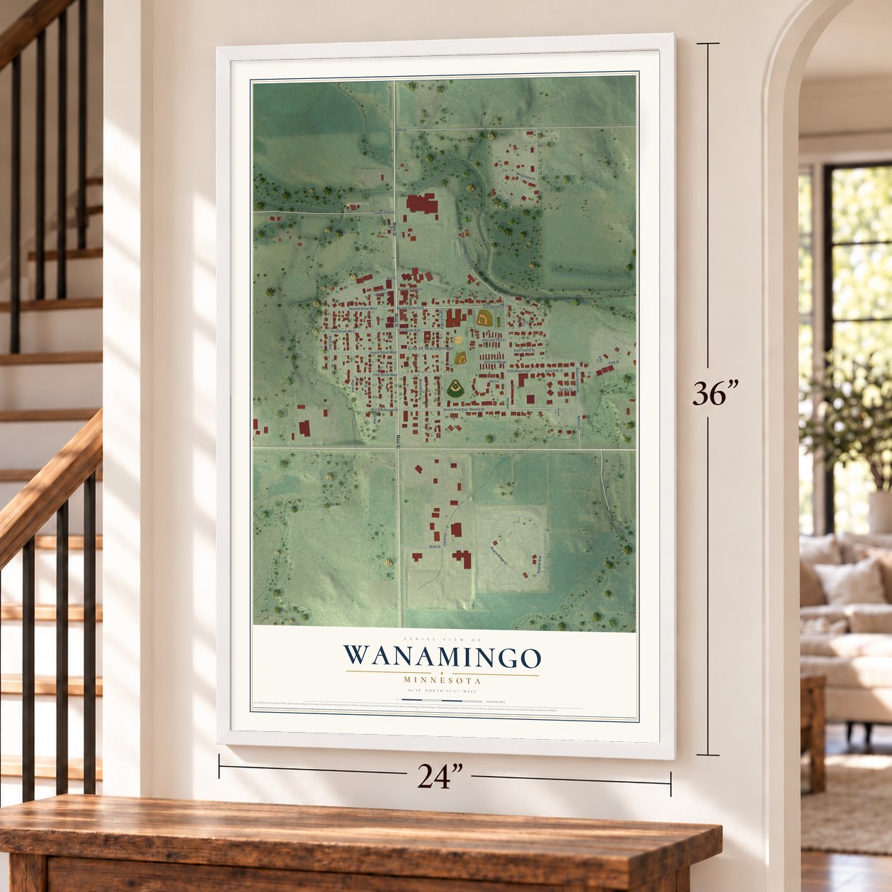 Wanamingo, Minnesota map, 24 x 36 inch print in a white frame by a staircase