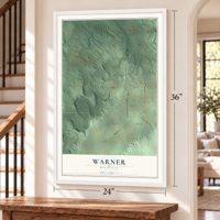 Warner, Michigan map, 24 x 36 inch print in a white frame by a staircase