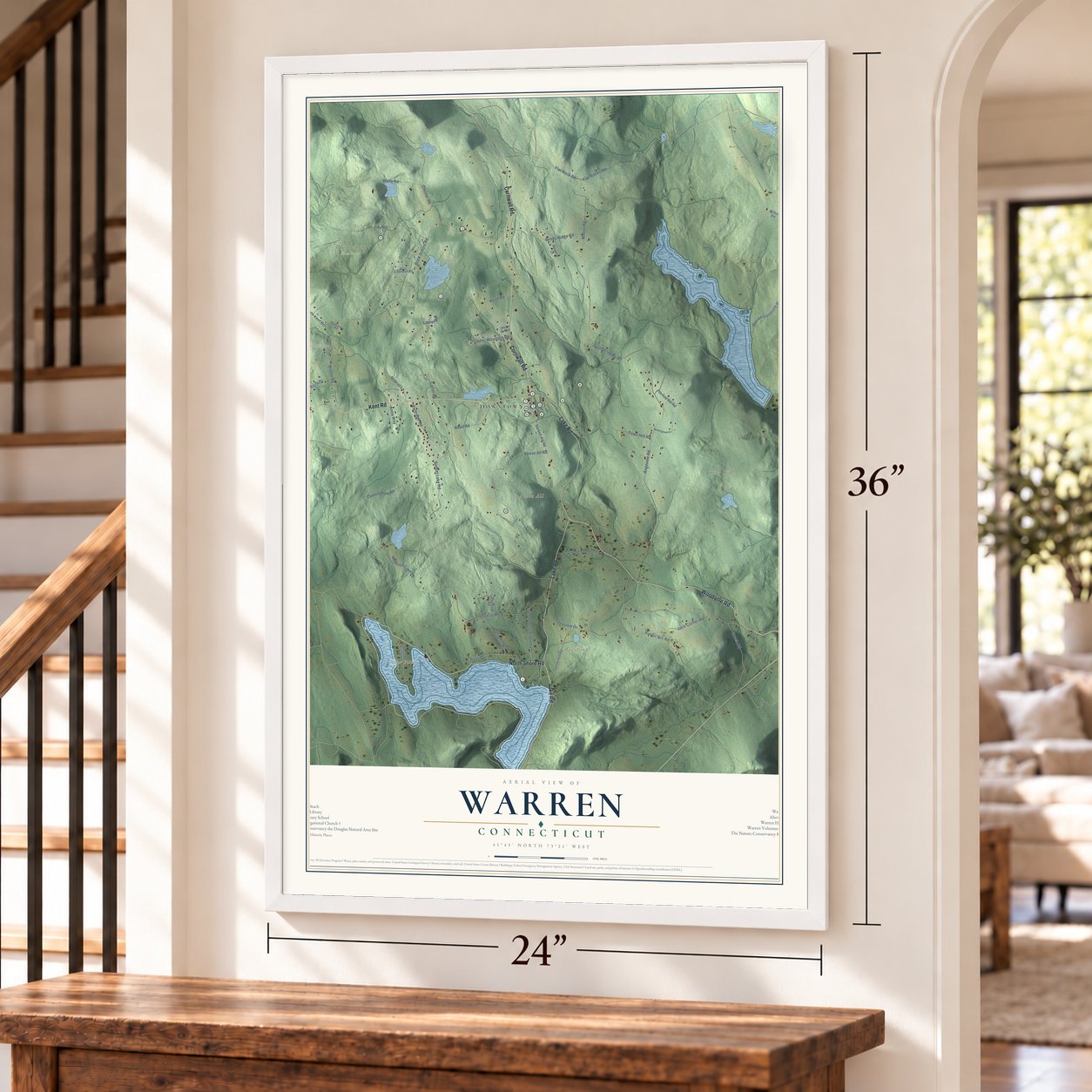 Warren, Connecticut map, 24 x 36 inch print in a white frame by a staircase