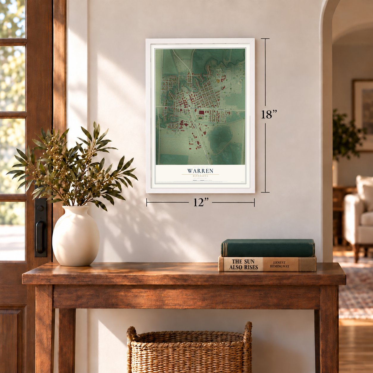 Warren, Minnesota map, 12 x 18 inch print in a white frame in an entryway