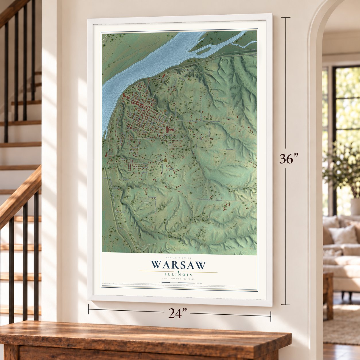 Warsaw, Illinois map, 24 x 36 inch print in a white frame by a staircase