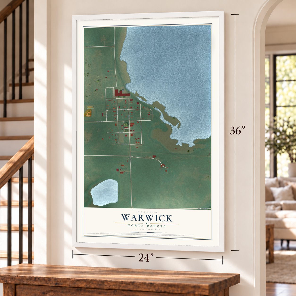 Warwick, North Dakota map, 24 x 36 inch print in a white frame by a staircase
