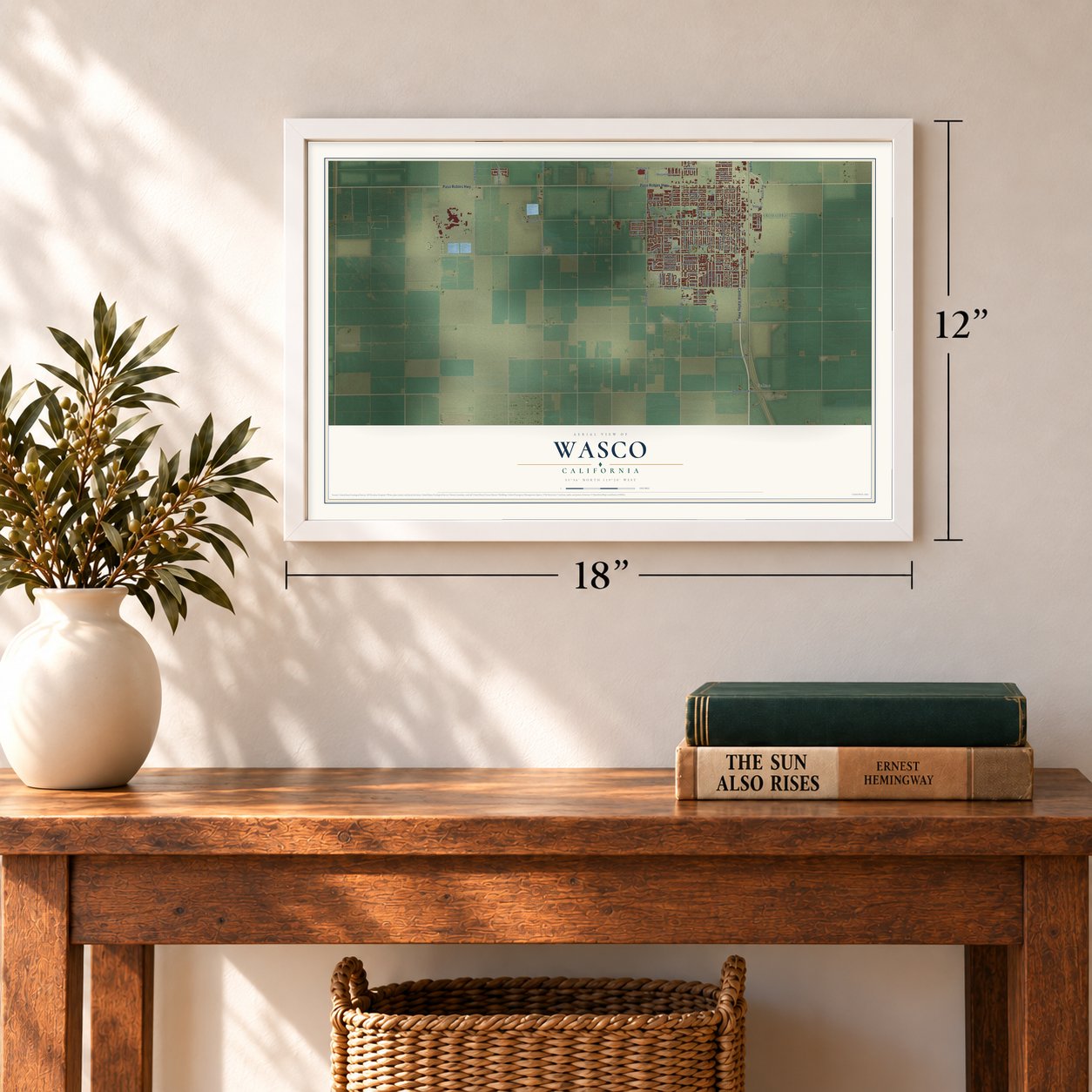 Wasco, California map, 12 x 18 inch print in a white frame in an entryway