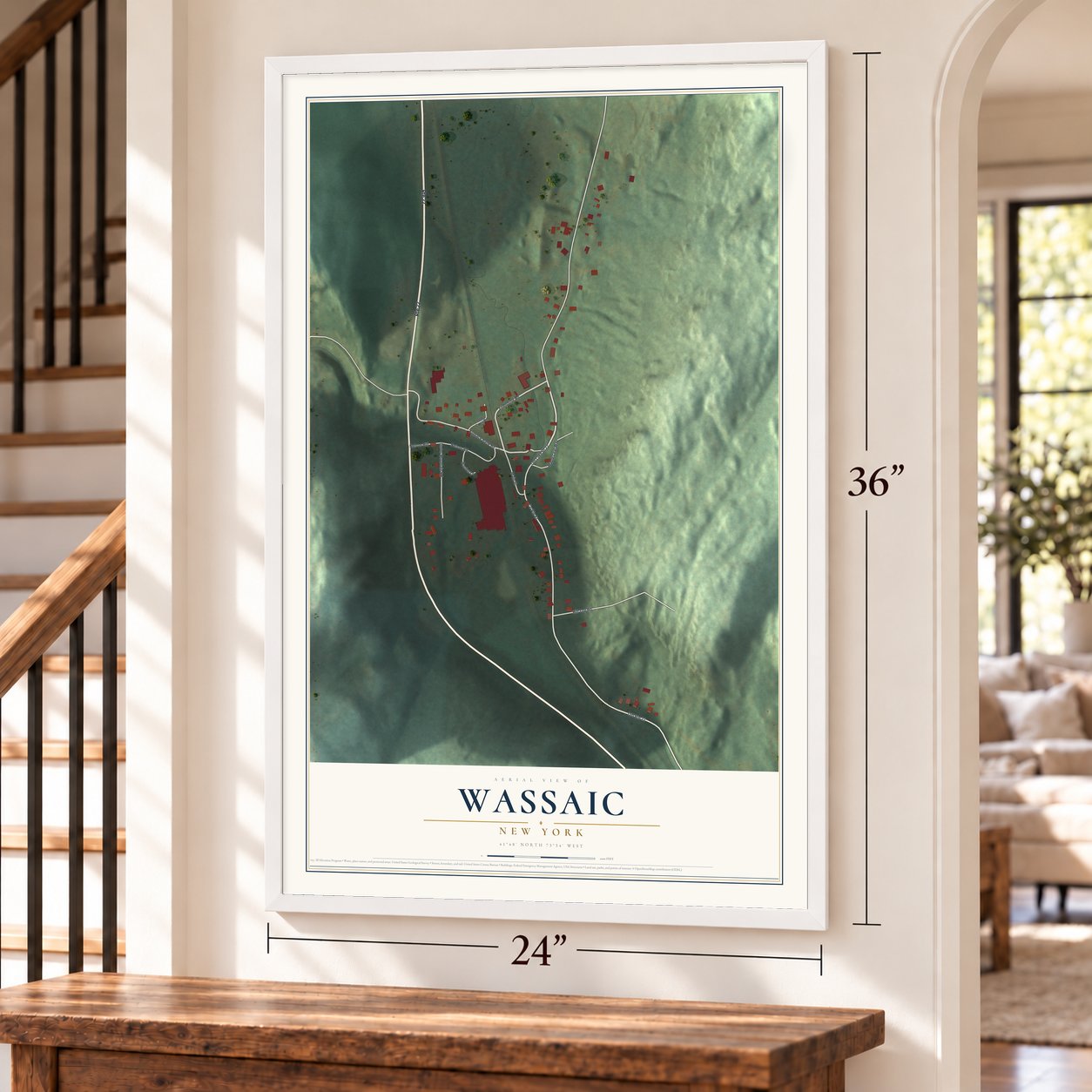 Wassaic, New York map, 24 x 36 inch print in a white frame by a staircase