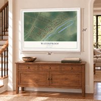 Waterproof, Louisiana map, 24 x 36 inch print in a white frame above a dresser by a staircase