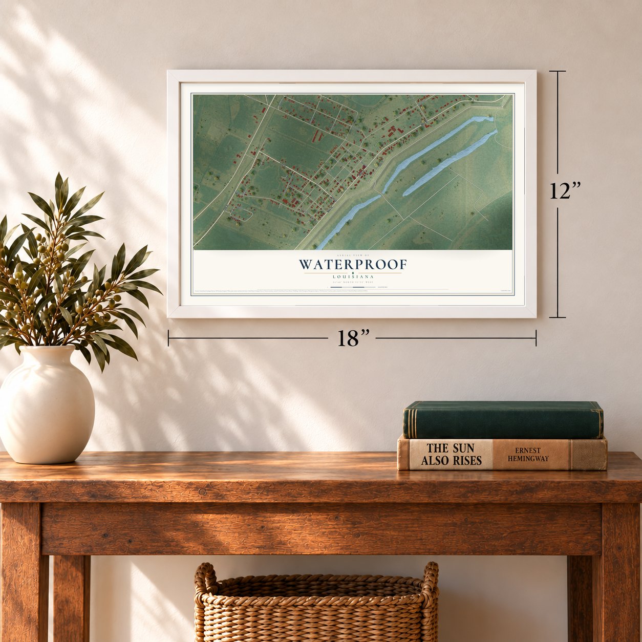 Waterproof, Louisiana map, 12 x 18 inch print in a white frame in an entryway