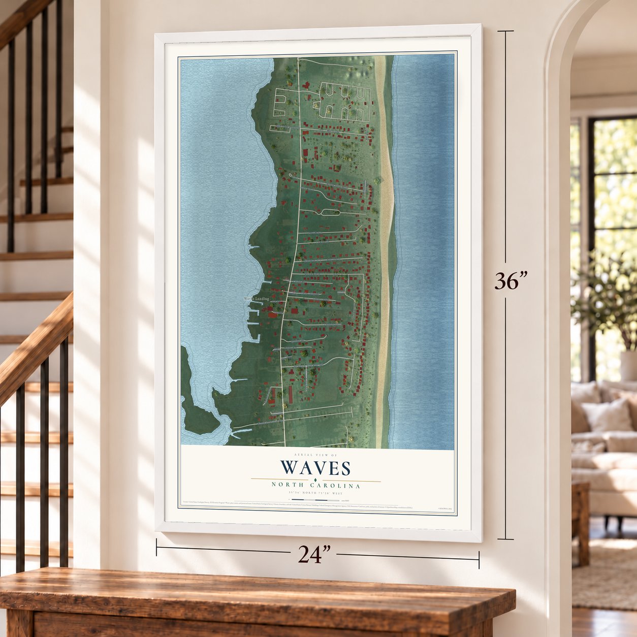 Waves, North Carolina map, 24 x 36 inch print in a white frame by a staircase